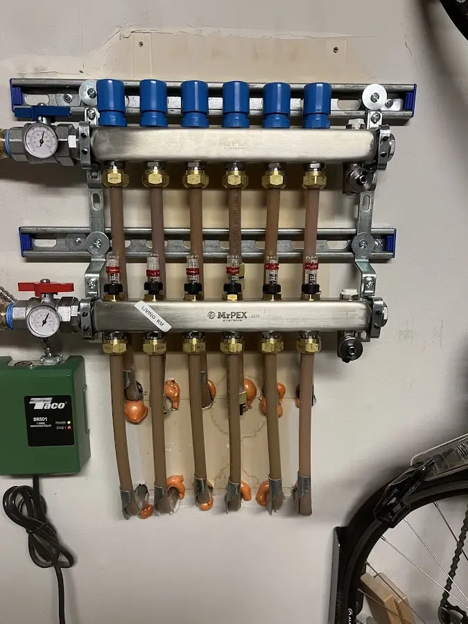 Plumber performing Water Heater Repair at a residential property in St. Helens